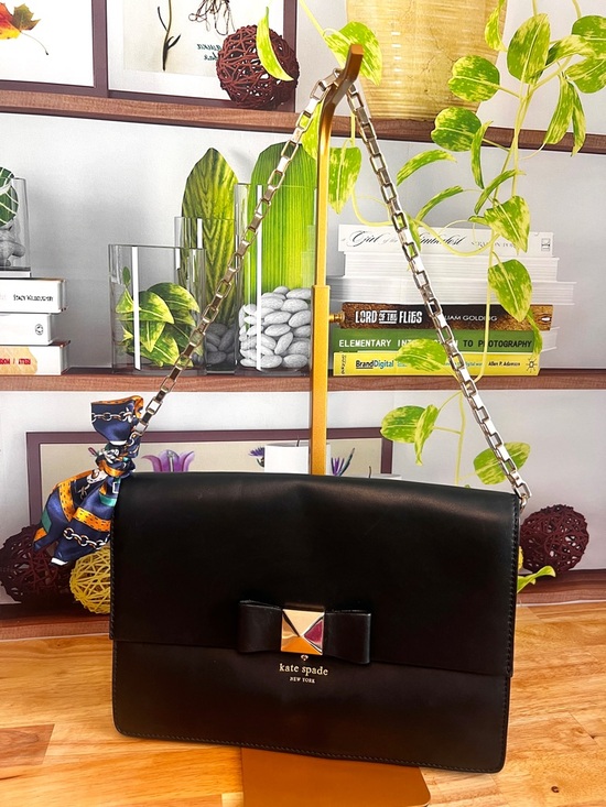kate spade Handbags - Kate Spade New York Black Leather Clutch Bag with Shoulder Strap and Bow Accent